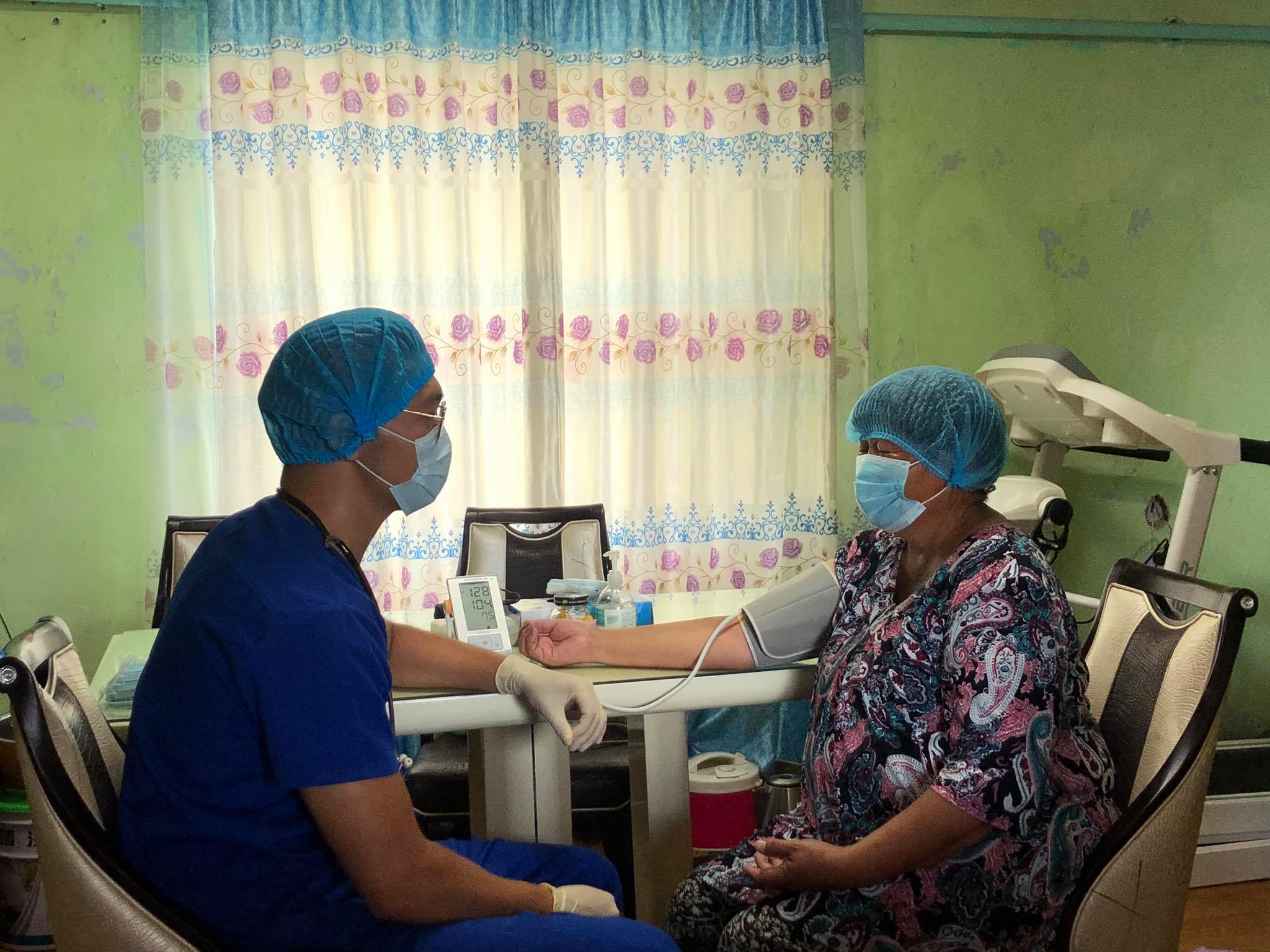 Mongolia - headline image - Dr B.Usukhbayar doing homevisit to his patient Mrs J.Jargal