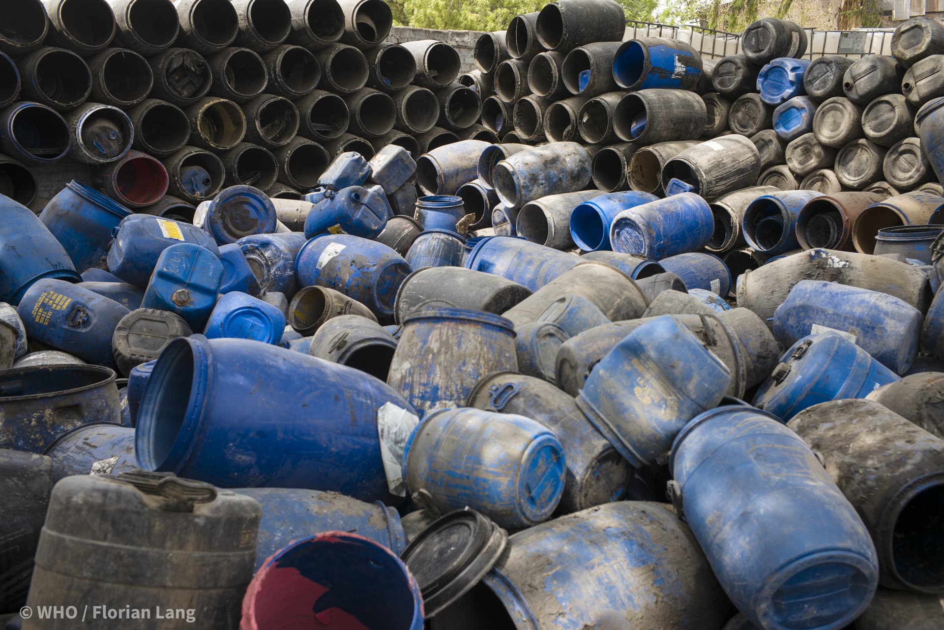 Empty barrels at a dumping site.